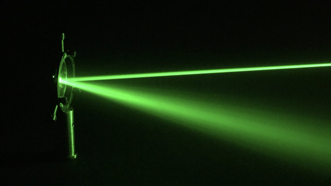 An Experimental Tour-de-force: Entanglement Between Glass Bead and Light