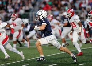 Westerly Football Falls to St. Raphael 14-7 in Rain-Soaked Battle