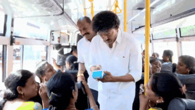Global Perspective: CM Vijay plays bus conductor, hands out tickets after expanding free travel scheme