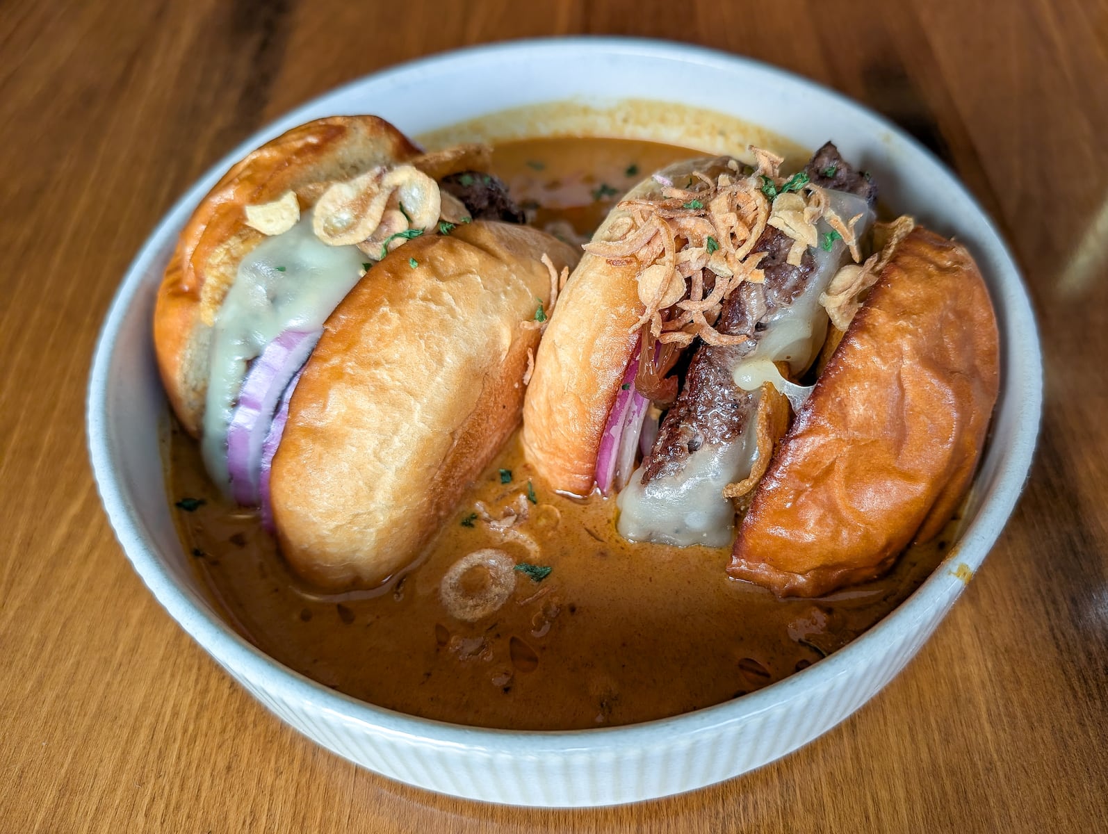 One of the Best Burgers Around Boston Is Served on a Bed of Curry