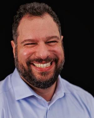 Michigan House Showdown: Democrat Kiel Reid Takes on GOP Incumbent Greg VanWoerkom in District 88