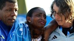 Injured Assefa narrowly misses world record in Berlin