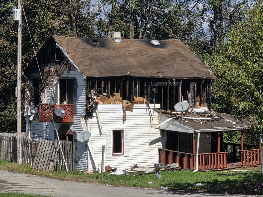Fire Damages Vacant House in Brownsville as Market Analysts Weigh Next Moves