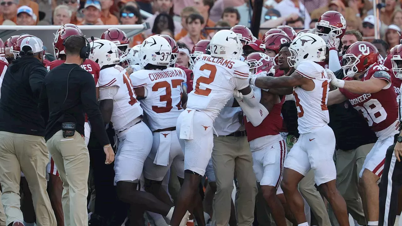 Coaches Restrain Texas and Oklahoma Players in Heated Postgame Exchange