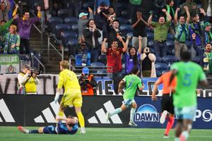 Corporate Strategy: Cristian Roldan scores in the 90th minute to give the Sounders a 2-1 victory over Sporting KC