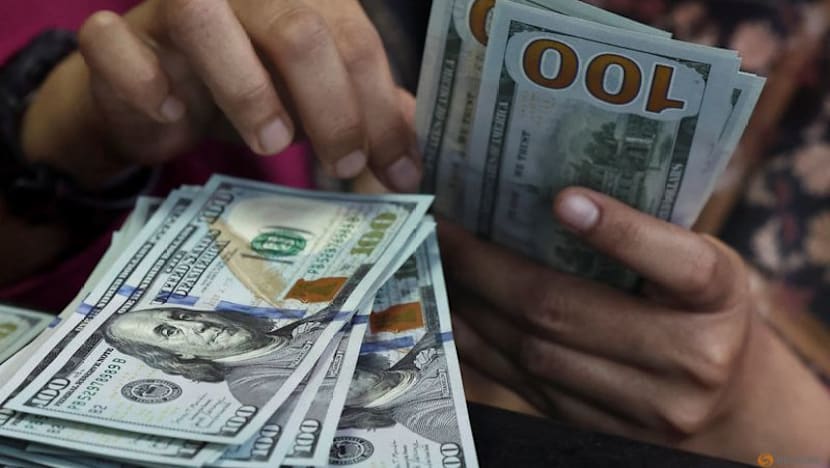 Dollar Holds Losses As Markets Await Fed Minutes, Speakers