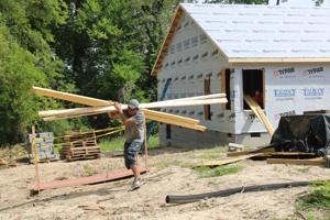 Corporate Strategy: Habitat lands $150K grant for new Danville home build