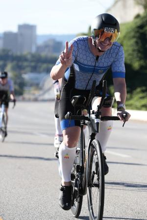 Livermore's Hardison Competes in First Ironman Race Amid Shifting Economic Pressures