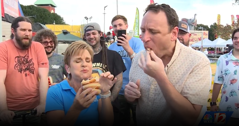 Joey Chestnut Takes on WXII 12's Lanie Pope in Hot Dog Krispy Kreme Eating Challenge