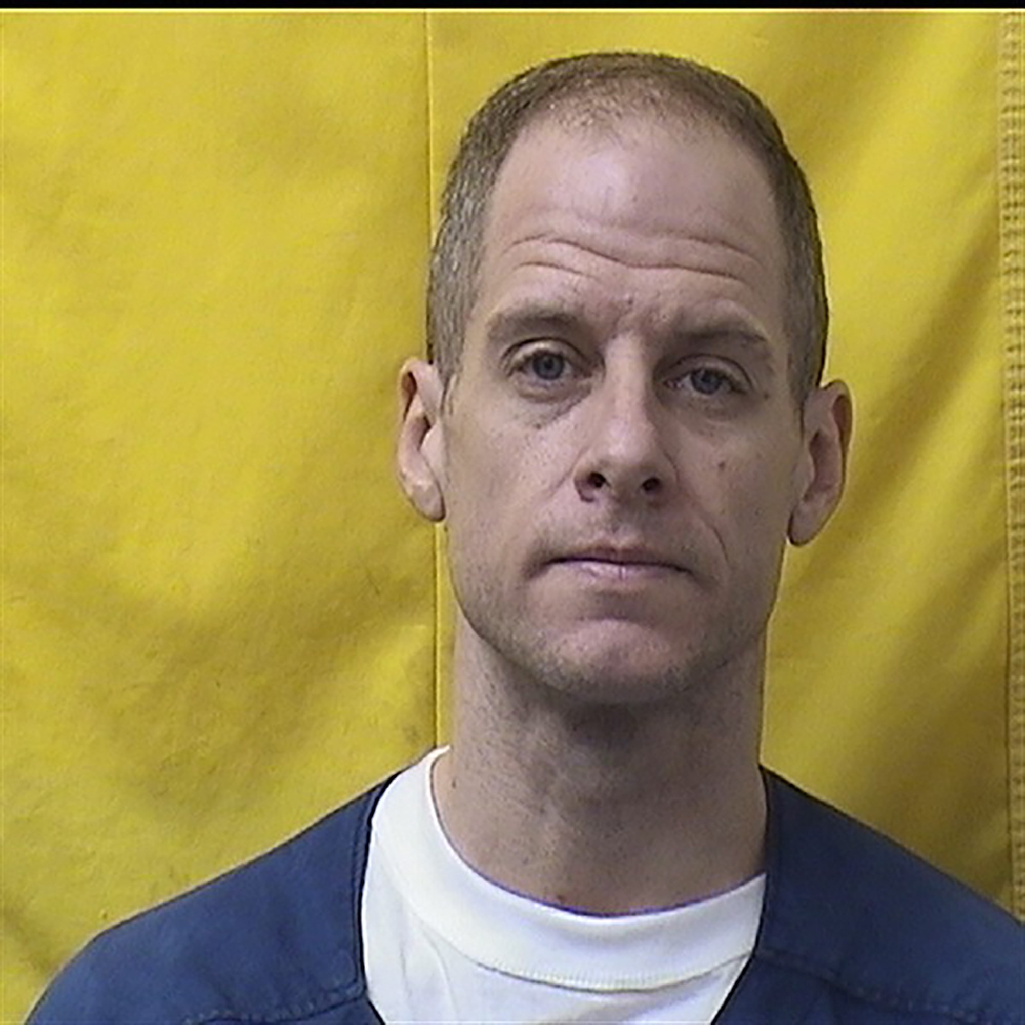 American Idol’ Alum Caleb Flynn Gives Dead-eyed Glare in New Prison Mug After Murder Conviction