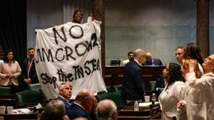 Market Developments: Charlane Oliver Sues Over Special Session Protest Punishments