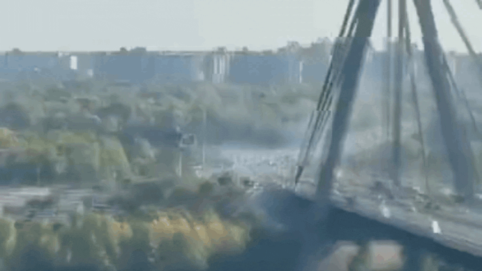 Huge Fireball Erupts As Russian Drone Hits Kyiv Bridge in Daylight- Video